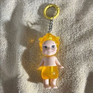 Sunny angel keychain NWOT